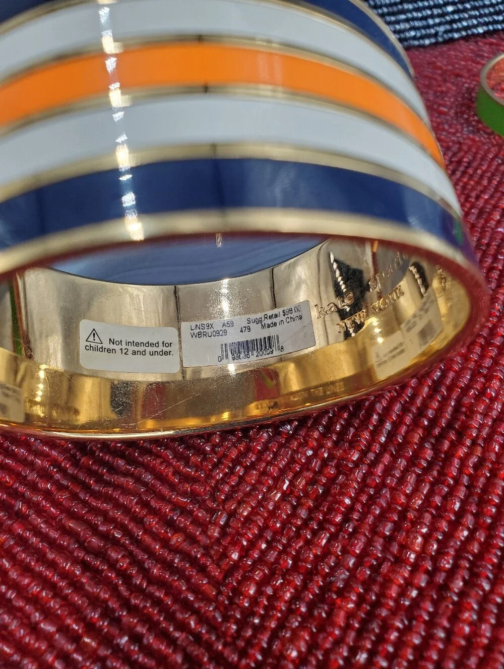 Two vibrant enamel and gold-plated bangle bracelets from Kate Spade New York. - Picture 9 of 17